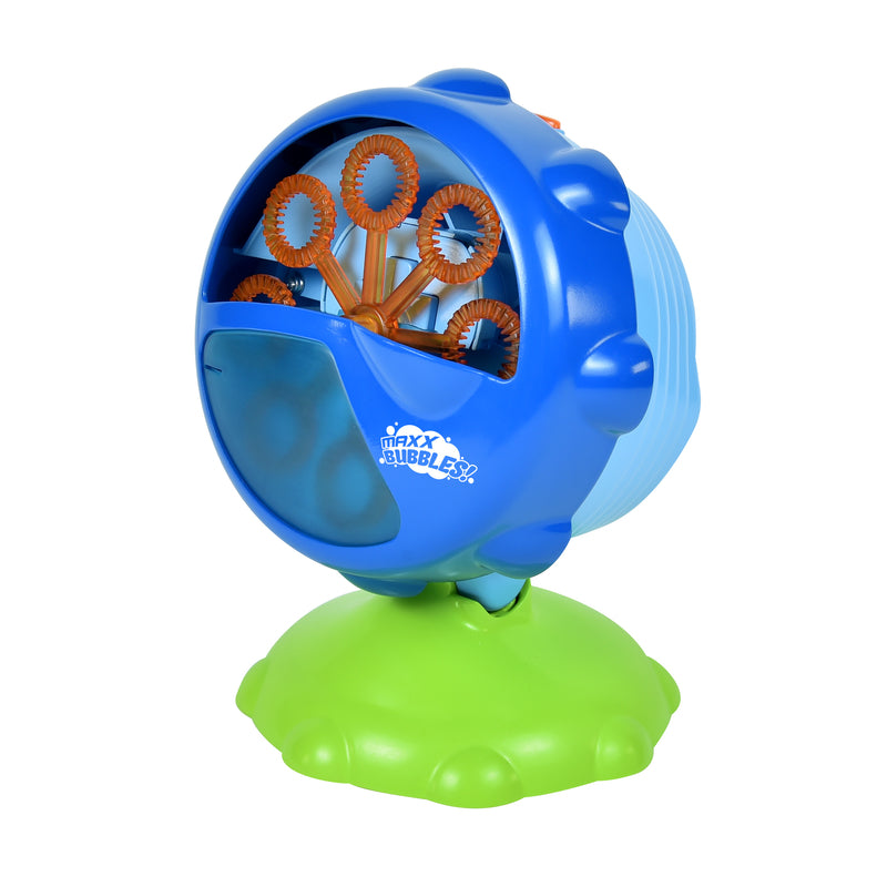 Blue bubble blower machine with orange wand spinners on green base, LED lights visible inside dome
