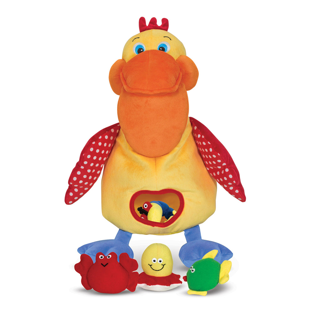 Plush pelican toy with yellow body, orange beak, red crest, and polka-dot wings, featuring a heart-shaped pouch on belly; includes three small plush sea creatur
