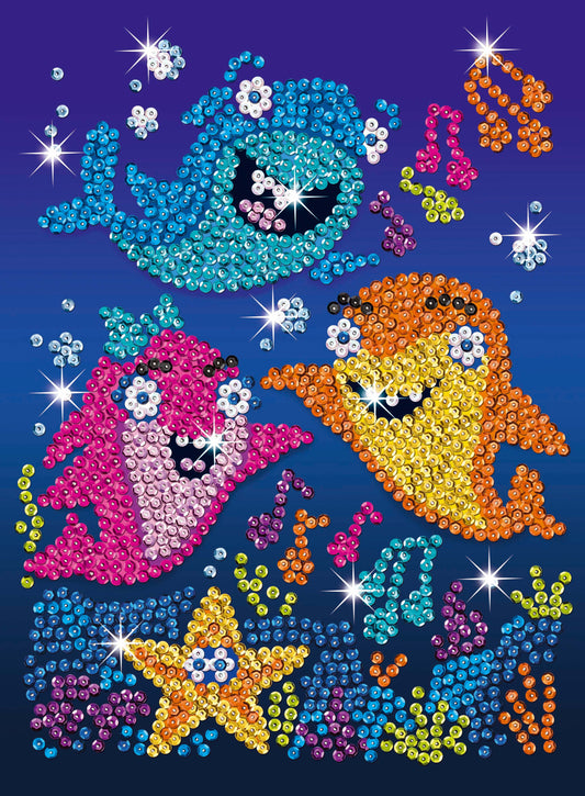 Sequin Art Kit showing colorful beaded designs of sea creatures including sharks, fish, and jellyfish in turquoise, pink, orange, yellow, and blue on dark blue