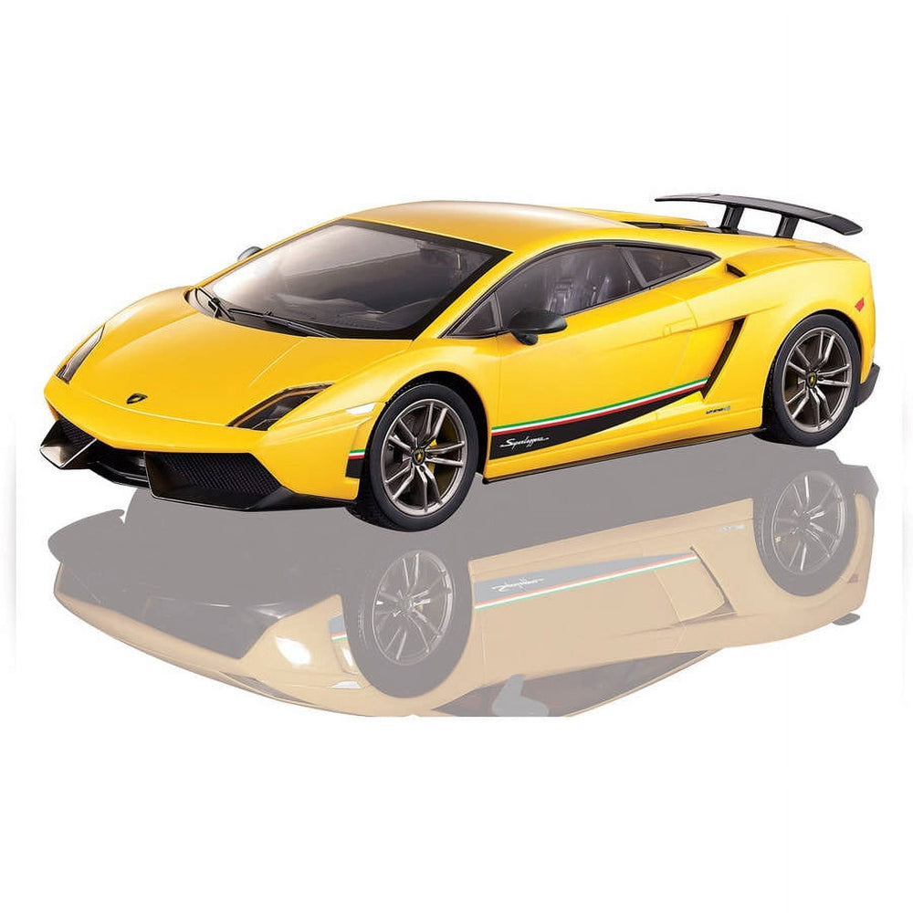 Yellow and black remote control Lamborghini Gallardo sports car model at 1:14 scale on plain background