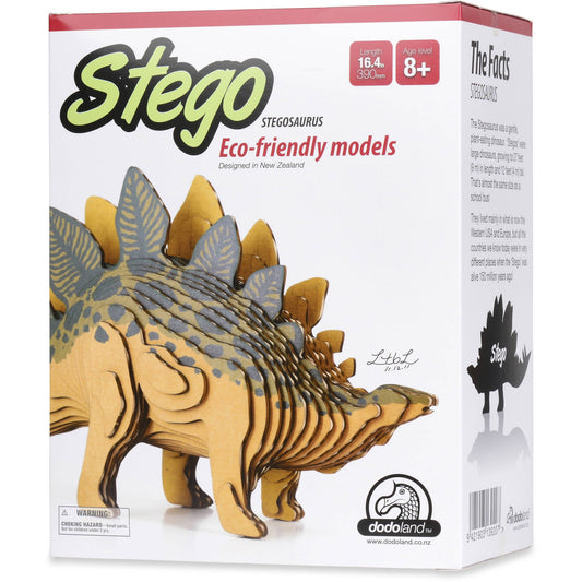 Stego Stegosaurus eco-friendly cardboard model kit, yellow and gray assembled dinosaur figure on white box packaging, age 8+