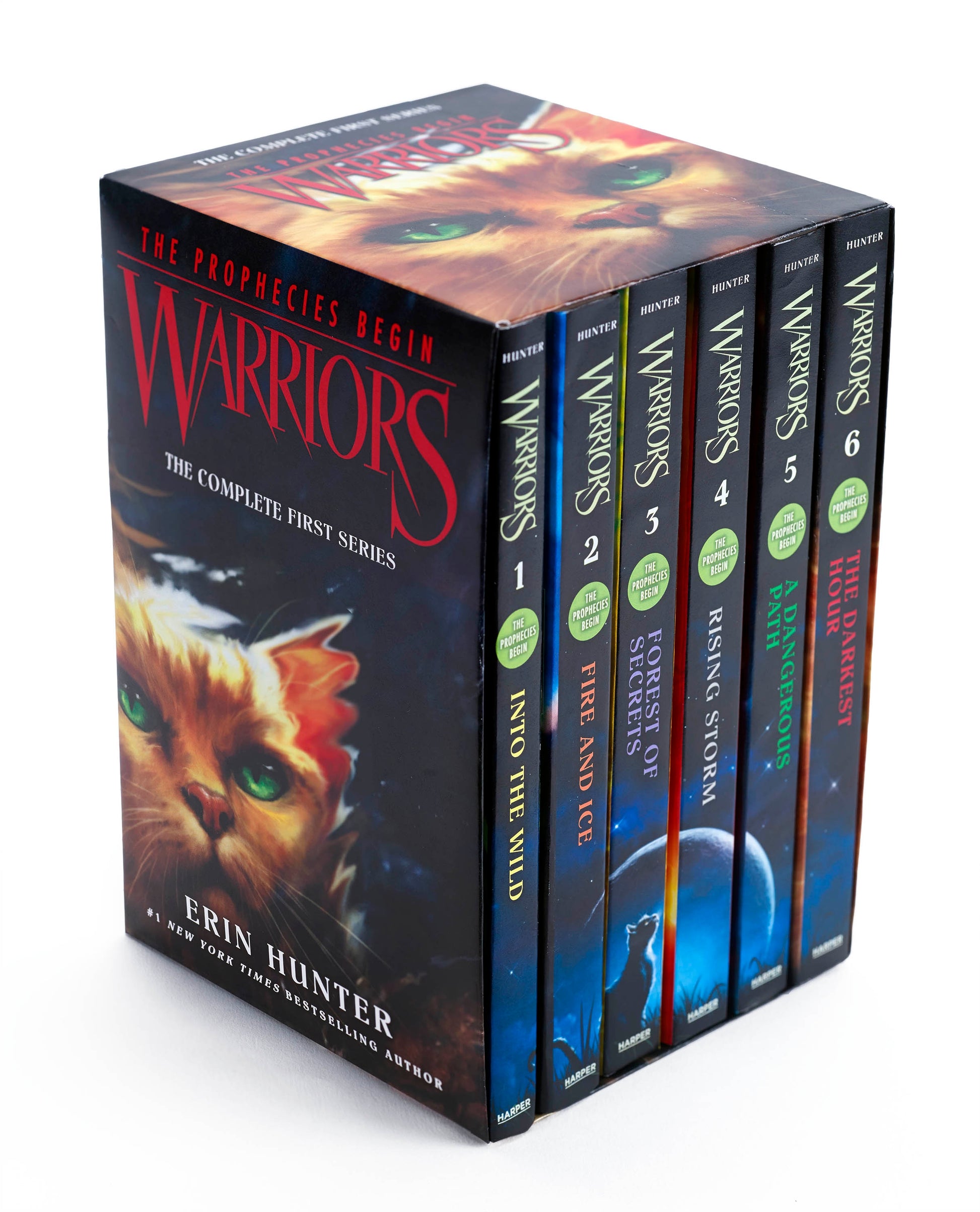 Warriors Complete First Series box set containing 6 books with spines numbered 1-6, featuring a cat with glowing green eyes on the front cover
