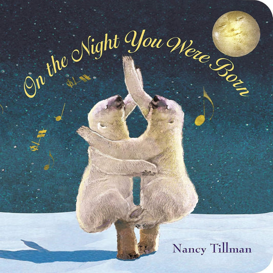 On the Night You Were Born board book cover featuring two polar bears hugging under a starry night sky with a golden moon and musical notes