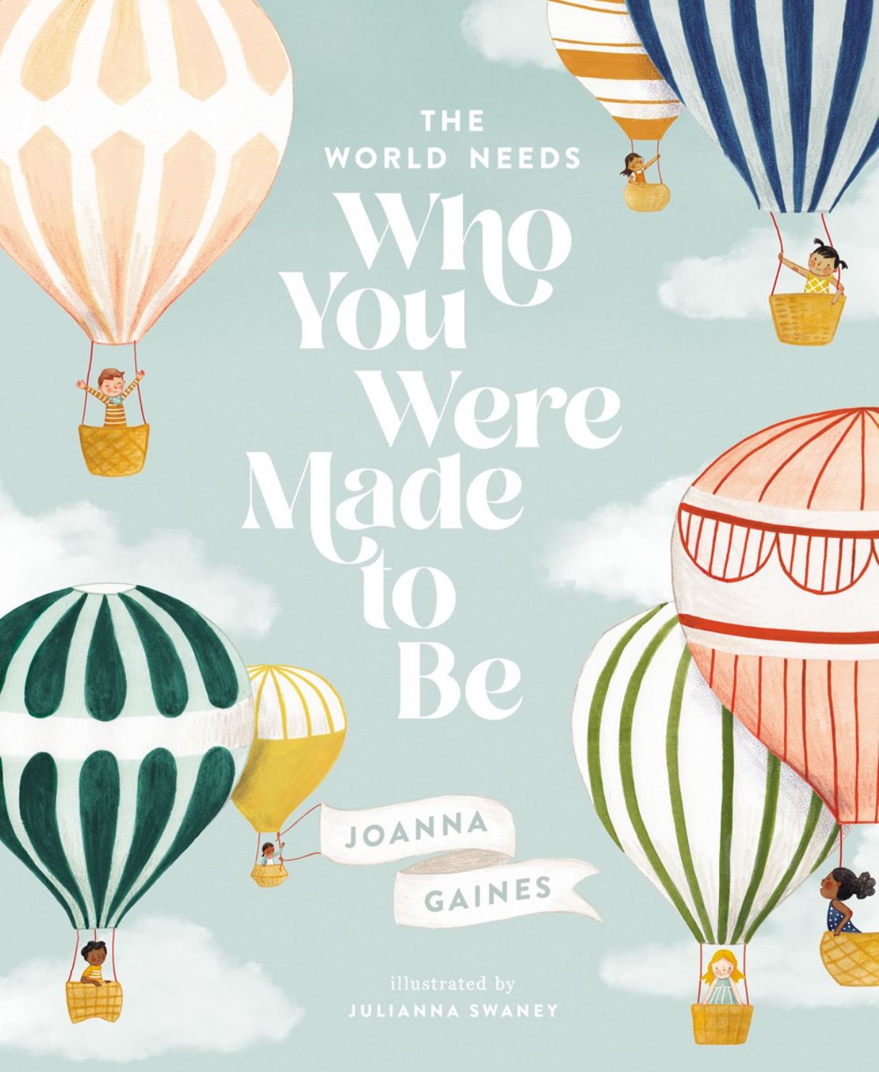 The World Needs Who You Were Made to Be by Joanna Gaines, illustrated by Julianna Swanney. Book cover featuring children in colorful hot air balloons floating i