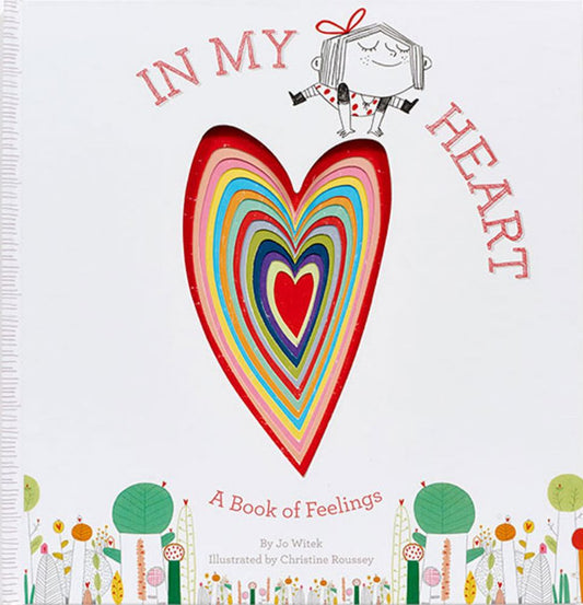 In My Heart: A Book of Feelings book cover featuring a colorful nested heart design with a whimsical illustrated girl with red hair and red bow at the top, surr