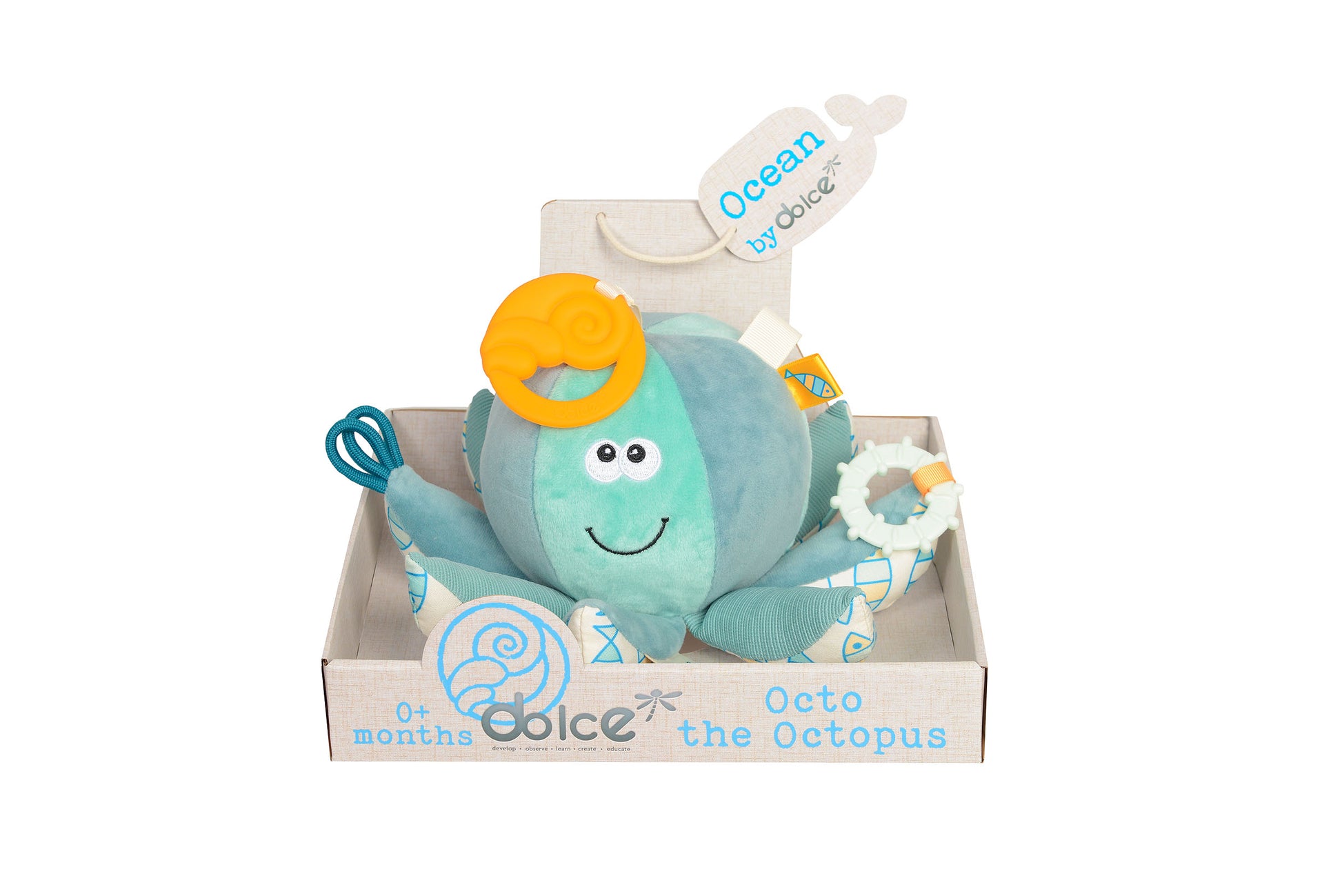 Turquoise plush octopus with smiling face, yellow teether ring, white rattle ring, and patterned tentacles, displayed in branded box