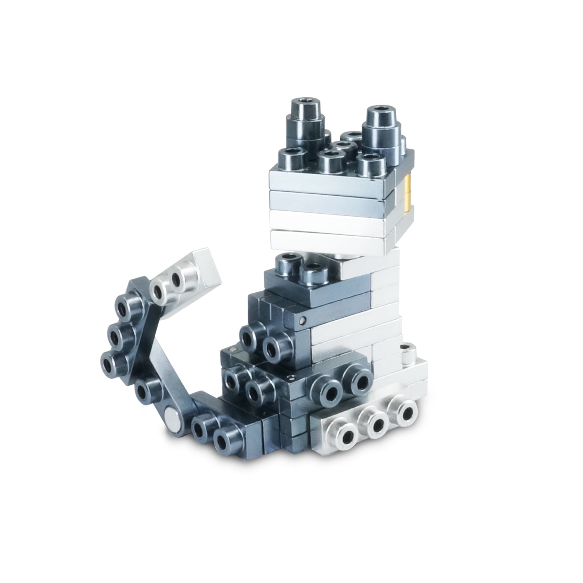 Stacked modular building blocks in white, light blue, dark blue, and black with silver metallic connector pieces, forming an abstract sculptural structure