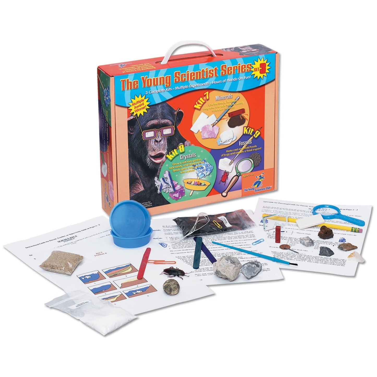 Young Scientist Series earth science learning kit with carrying case, featuring three experiments: minerals, crystals, and fossils. Includes instruction booklet