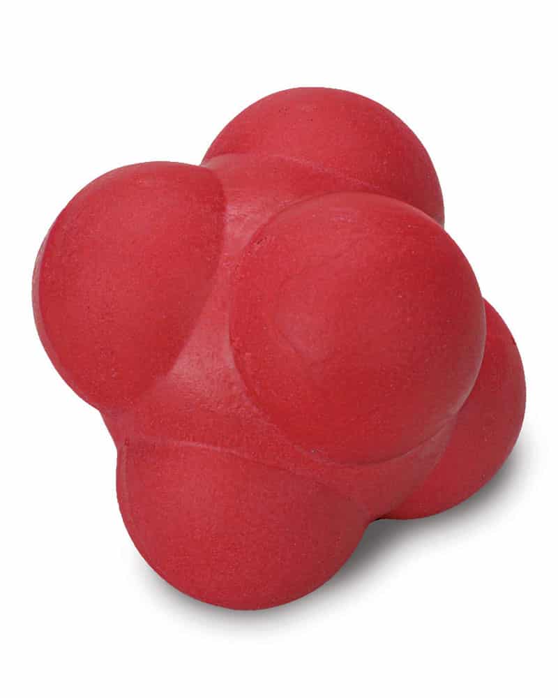 Red rubber reaction ball with four bumpy spherical lobes on a plain white background
