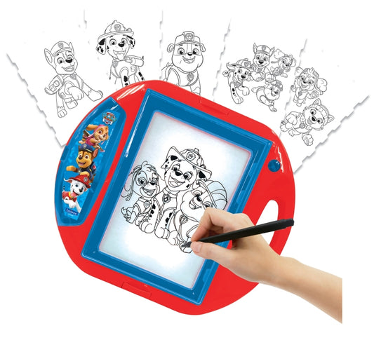 Child's hand drawing with marker on red and blue projection device displaying Paw Patrol characters, with character templates shown above on white background