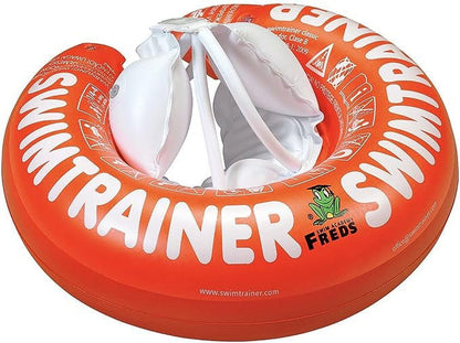 Red inflatable swim trainer with white text and frog logo, featuring white handles and interior white seat support