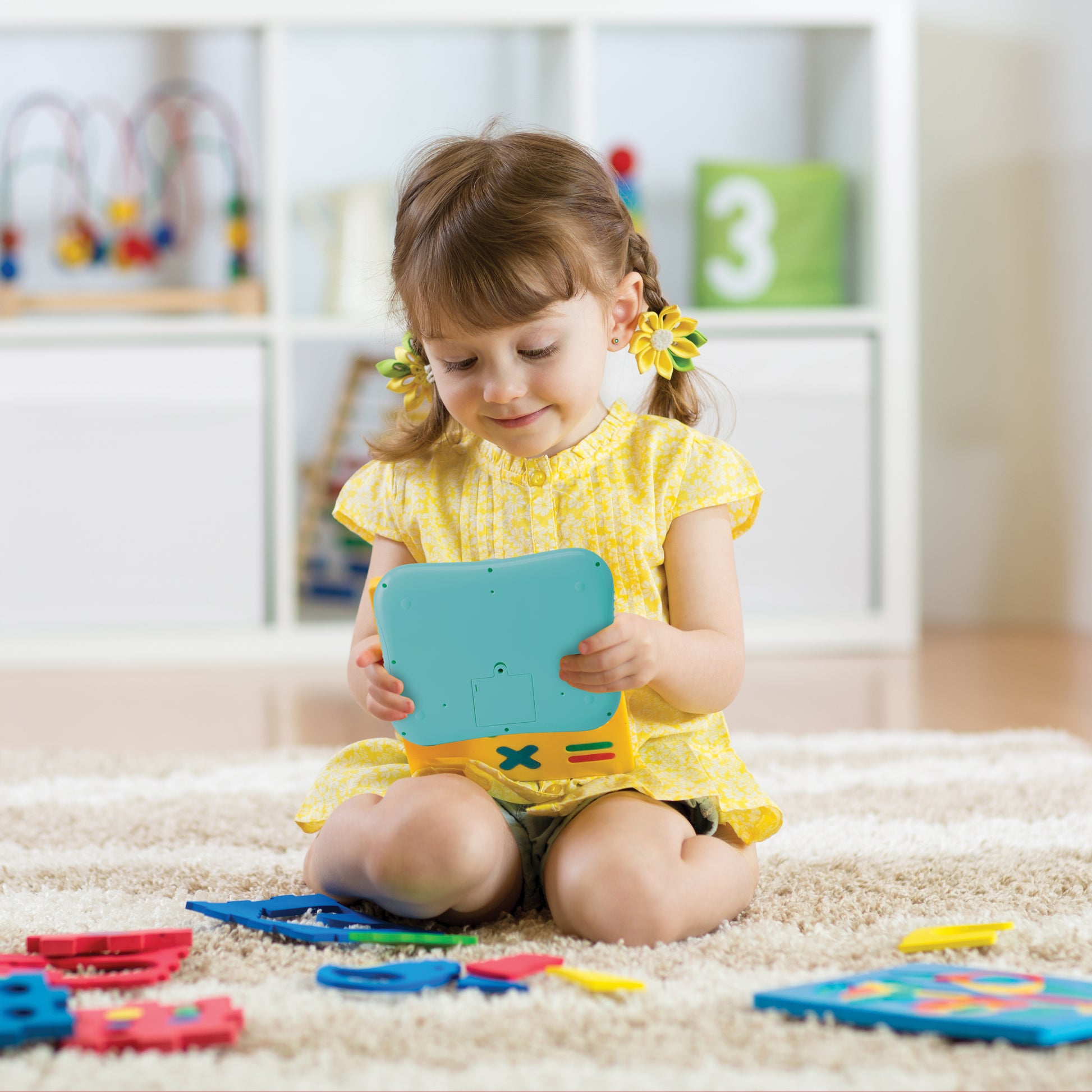LEXIBOOK ABC bilingual talking educational tablet with touch panel and LED display to illustrate interactions with the game in English and Spanish