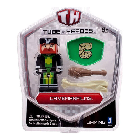 Tube Heroes Caveman Films action figure with red hair and black outfit, includes green shield accessory and brown and cream bone accessories, packaged in clear