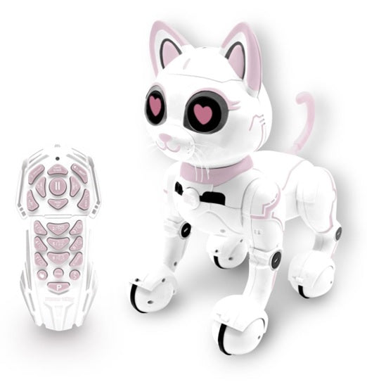 White and pink interactive robotic cat with large black eyes, pink heart-shaped pupils, pointed ears, and whiskers, shown with remote control