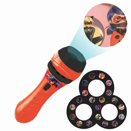 Red LED projector torch with black cap and Miraculous Ladybug character imagery, shown with projected images of Ladybug and Cat Noir characters and a black disc