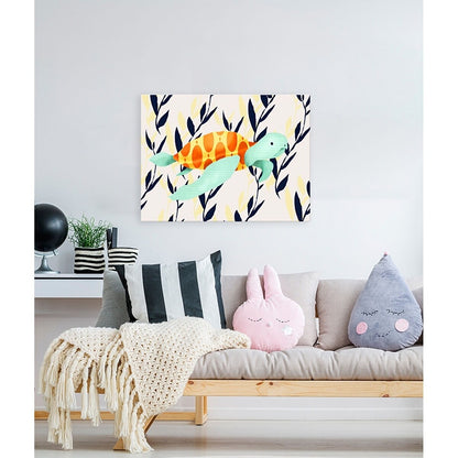 Canvas wall art featuring an illustrated sea turtle with orange and yellow shell and mint green flippers surrounded by navy and cream leaf pattern, displayed ab