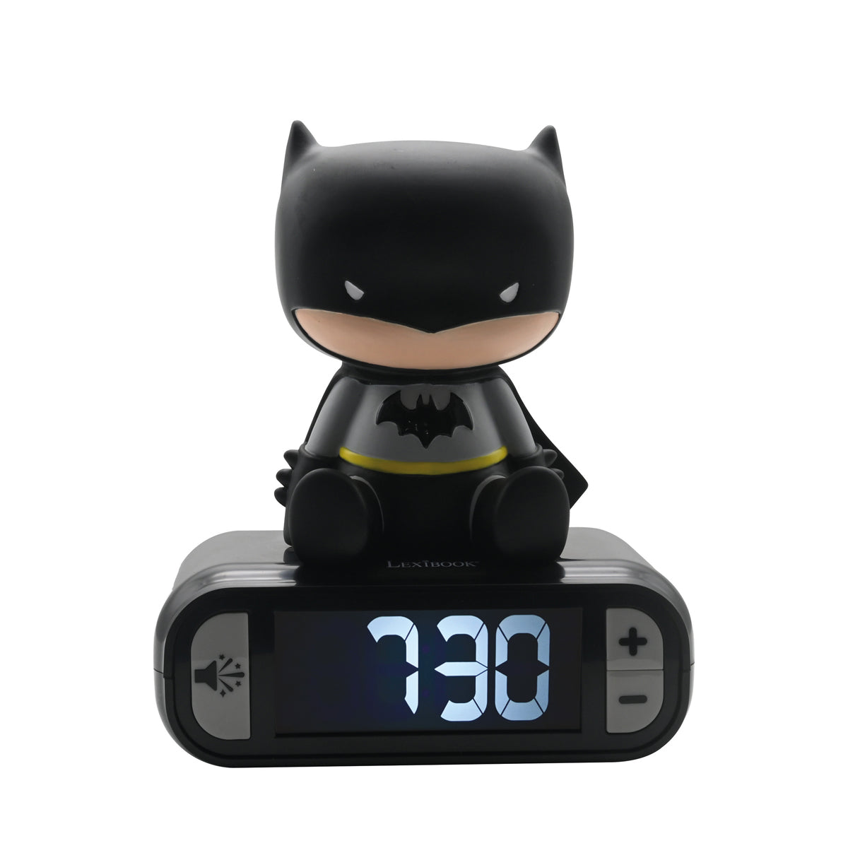 Black Batman figure sitting on top of a digital alarm clock displaying 3:30, with a bat symbol on the chest and yellow utility belt detail