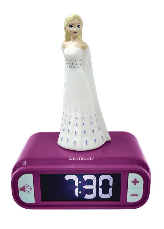 Disney Frozen Elsa doll figurine in white gown atop purple Lexibook digital alarm clock displaying 3:30, with night light and music controls