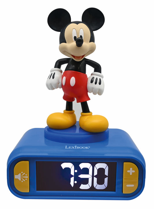 Mickey Mouse figure standing on blue digital alarm clock displaying 1:30, with yellow shoes, white gloves, red shorts, black top, and large round ears; Lexibook