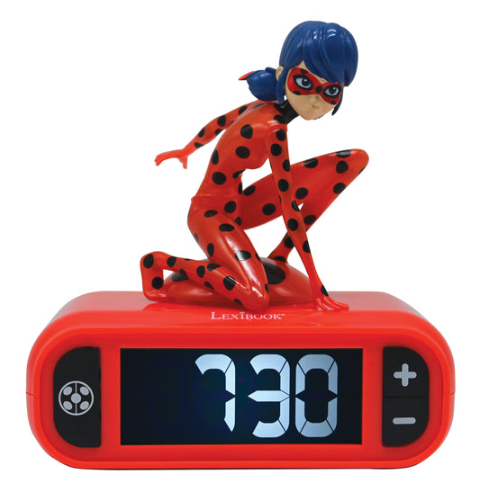 Miraculous Ladybug digital alarm clock with red body and black display showing 1:30, topped with red and black polka dot Ladybug character figure with blue hair