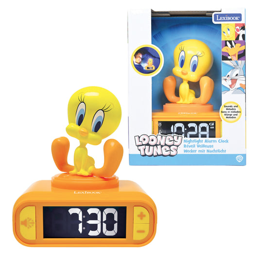 Looney Tunes Tweety nightlight alarm clock with yellow bird figure on orange base, digital display showing 7:30, and product packaging