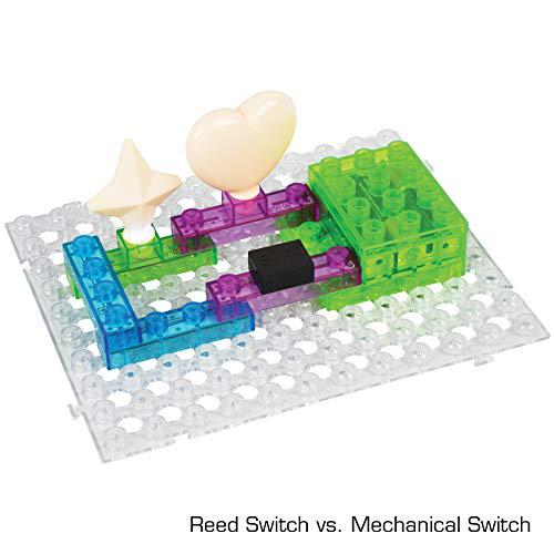 Circuit Blox 72 building block set with translucent colored blocks, gears, and cream-colored connectors on clear pegboard base