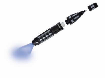 Black spy pen with diamond-patterned grip, disassembled to show interchangeable barrel and tip components, emitting blue invisible ink light beam