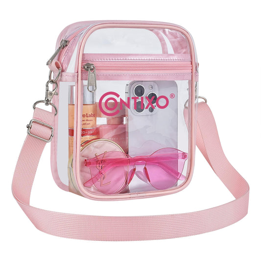 Pink clear crossbody bag with adjustable strap, filled with sunglasses and personal items, featuring Contixo branding