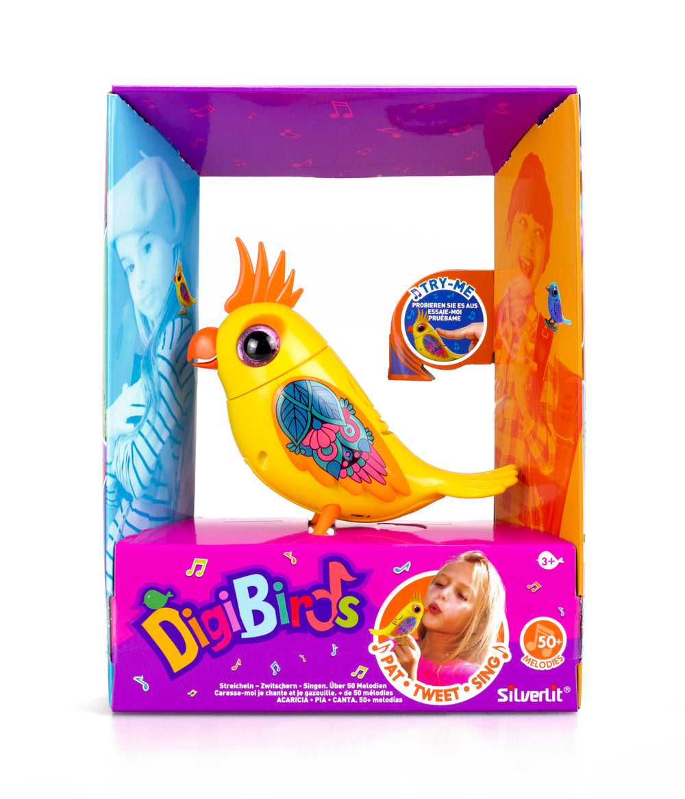 DiGi Birds II Interactive Single Cockatoo toy in yellow with orange crest, displayed in colorful packaging showing child on model using the toy, includes 50+ me