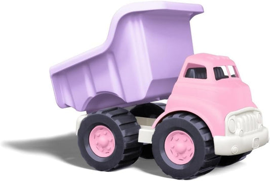 Pink and white dump truck with lavender tilting bed, black treaded wheels, on plain background
