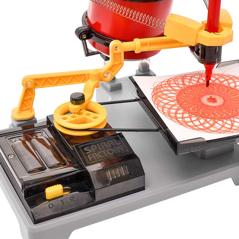 Spiral Factory art robot with red motor head, yellow articulated arm, and black base with ink cartridges creating circular spiral patterns on white paper