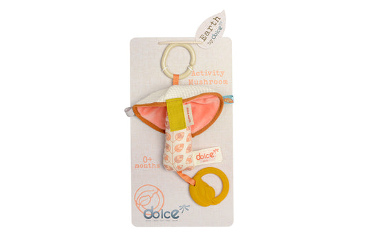 Dolce Activity Travel Mushroom infant toy with cream-colored mushroom cap, coral and leaf-patterned stem, attached ring teethers and tags, for 0+ months