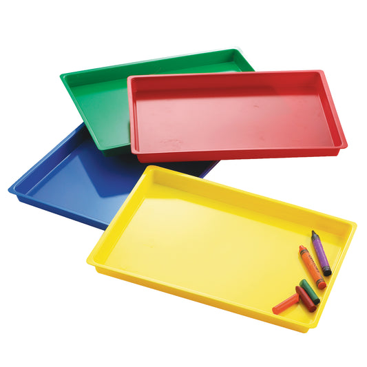 Set of four colorful plastic activity trays in green, red, blue, and yellow, stacked and fanned with crayons in the yellow tray