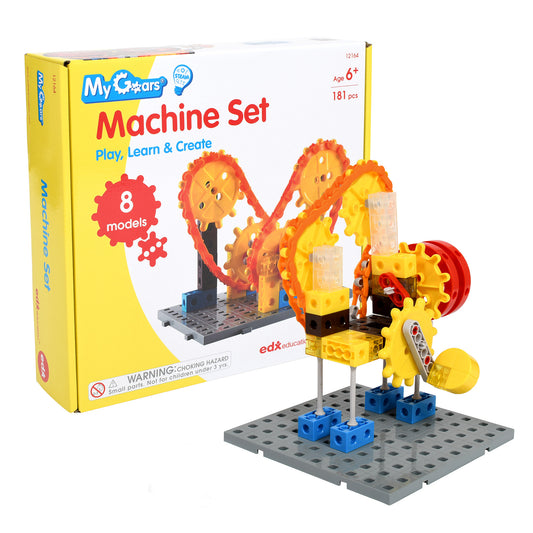 My Gears Machine Set building toy with yellow and red interlocking gears, blue base blocks, and gray platform base; box shown alongside assembled model