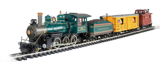 Large G scale model train set with teal steam locomotive #888, Pennsylvania passenger car, yellow cargo cars, and red caboose on black track