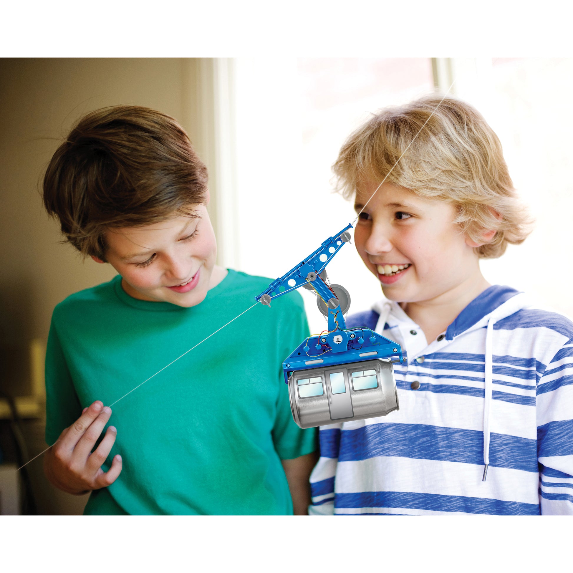KidzRobotix Tin Can Cable Car blue toy with two children playing
