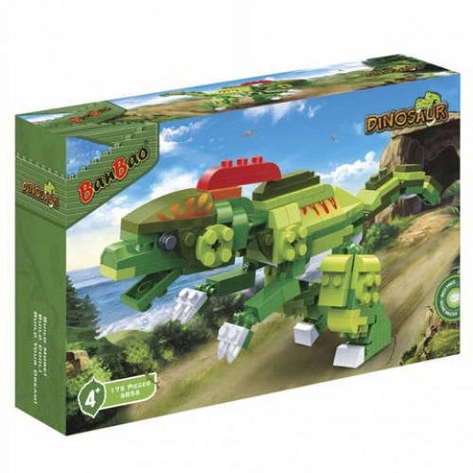 Green dinosaur-themed building block set with red and yellow accents, assembled into robot-like figures on landscape backdrop with beach and cave scenery