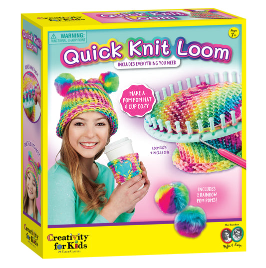 Quick Knit Loom box showing rainbow multicolor knitted hat with pom poms and matching cup cozy, modeled by a child wearing turquoise shirt