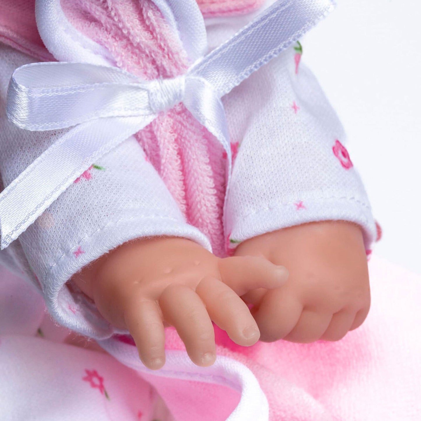 JC Toys La Baby 11 inch soft body doll with pink outfit, white socks, blanket and pacifier