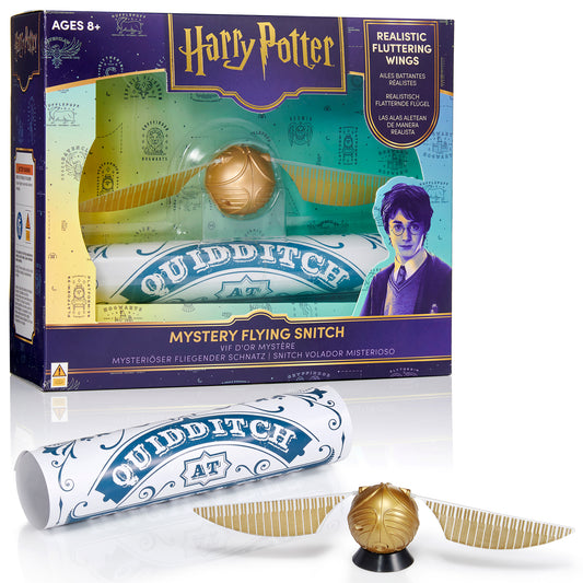 Harry Potter Mystery Flying Golden Snitch toy set with golden ball, white Quidditch tube, and gold wings with realistic fluttering action, displayed with packag
