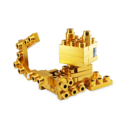 Metomics Pocket Pet Abyssinian Cat building set in Aztec Gold with interlocking gold and yellow plastic blocks and cylindrical pieces