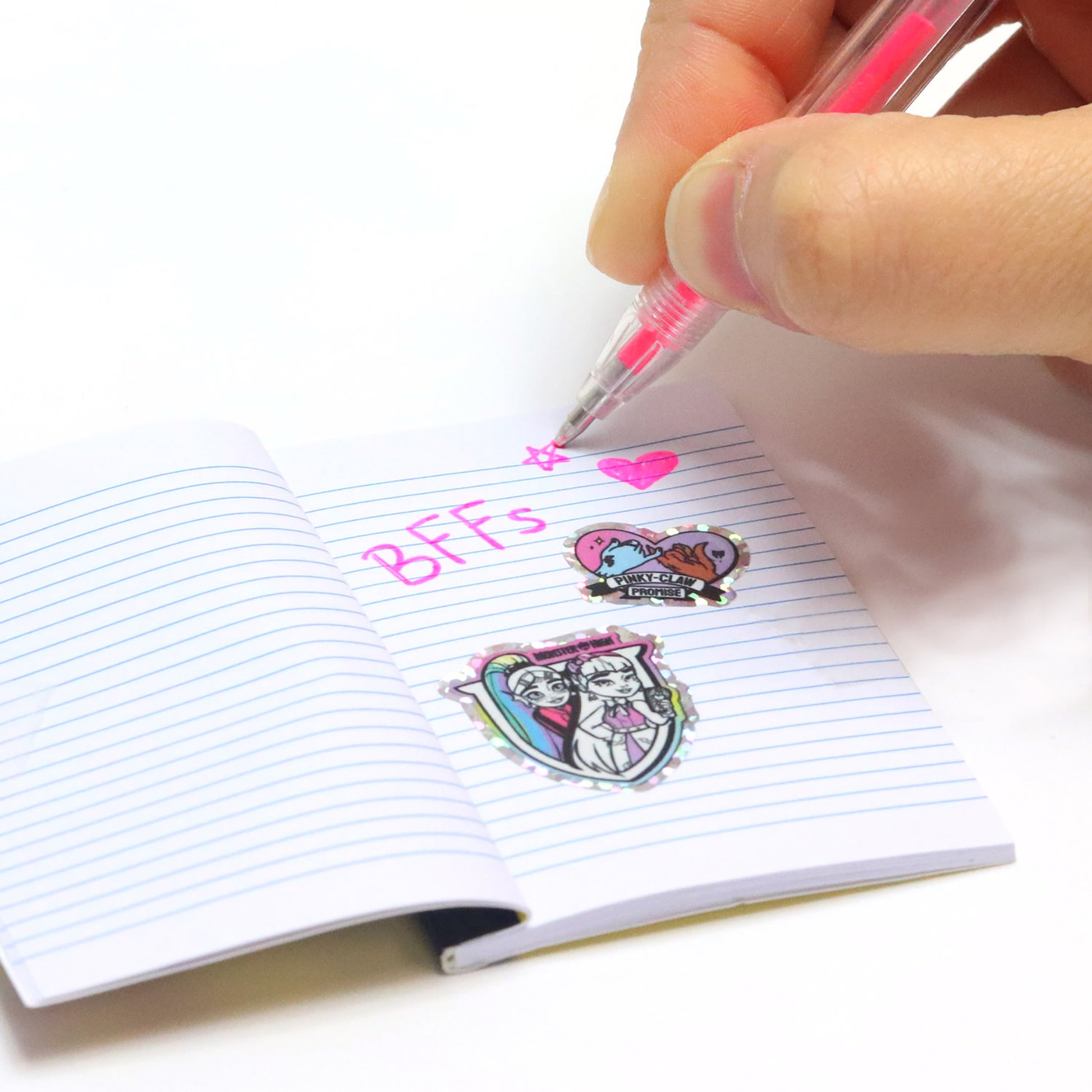 Monster High Locker Activity Set with pink gel pen writing on lined notebook