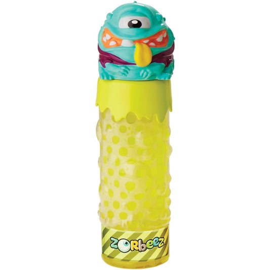 Zorbeez Monster Oozers One Eyed Joe squishy toy with turquoise head, orange and red mouth, yellow tongue, and lime green textured body with polka dots
