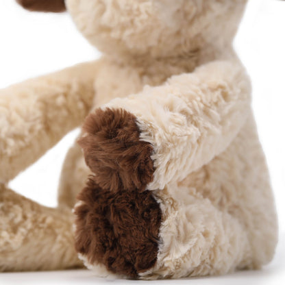 MCHUGS Toffee Dog Cute Pet Plush 9.8-Inch in brown and cream colors, shown from above