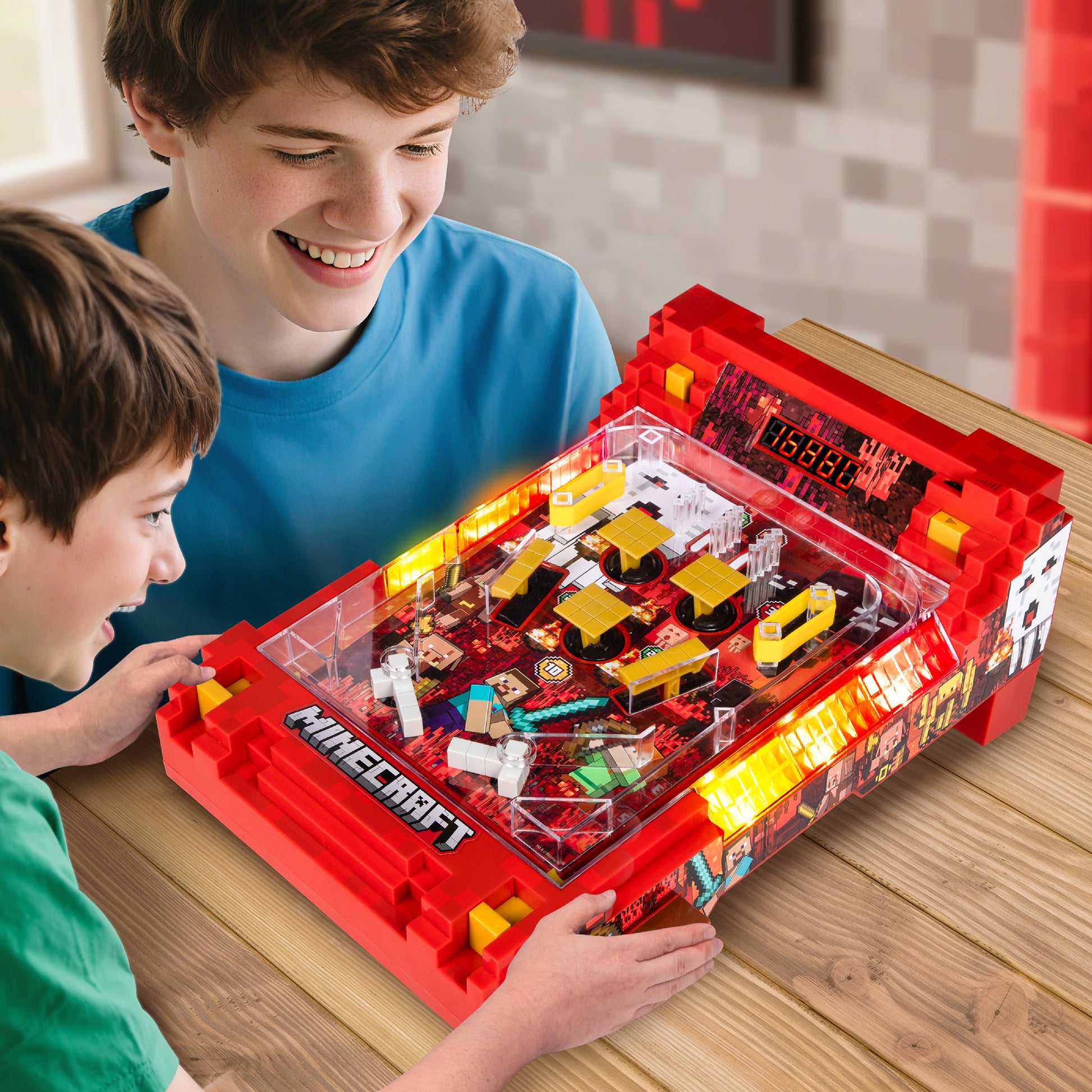 Minecraft Arcade Pinball Nether game with red case and yellow accents, kids playing