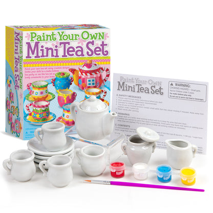 KidzMaker Paint Your Own Mini Tea Set with white ceramic pieces, paints, and brush