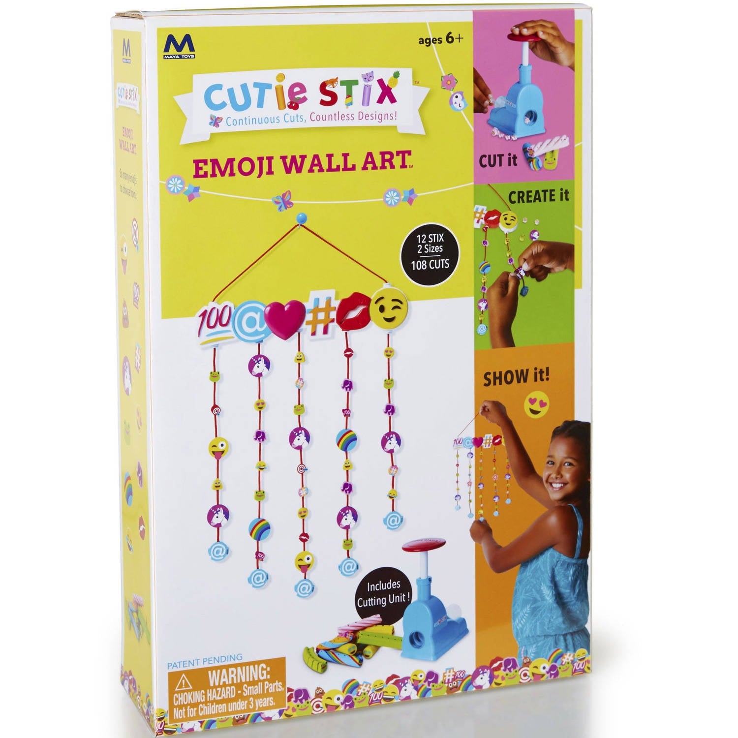 Cutie Stix Emoji Wall Art Kit packaging showing colorful emoji and symbol beads on strings, cutting tool, and child modeling finished hanging decoration