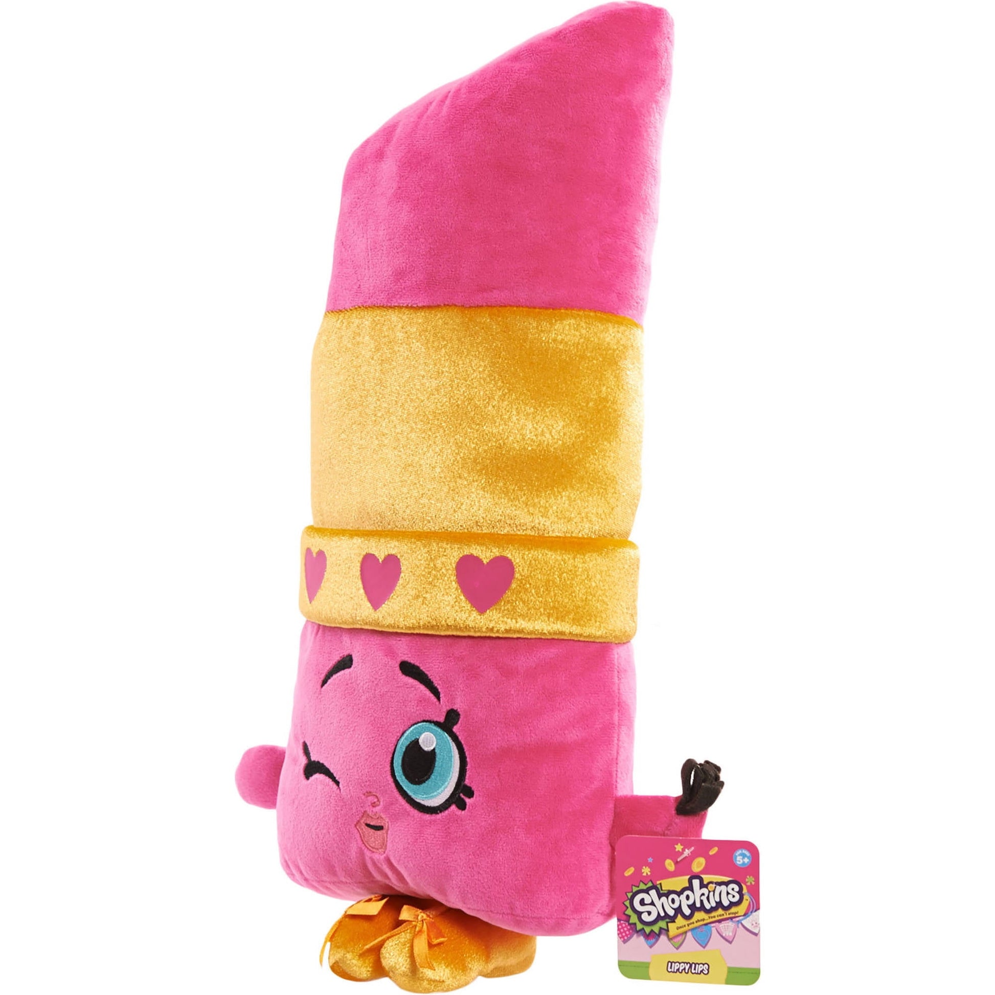 Pink and gold plush Lippy Lips Shopkins character with heart details, large blue eye, and small gold feet, displayed with product tag