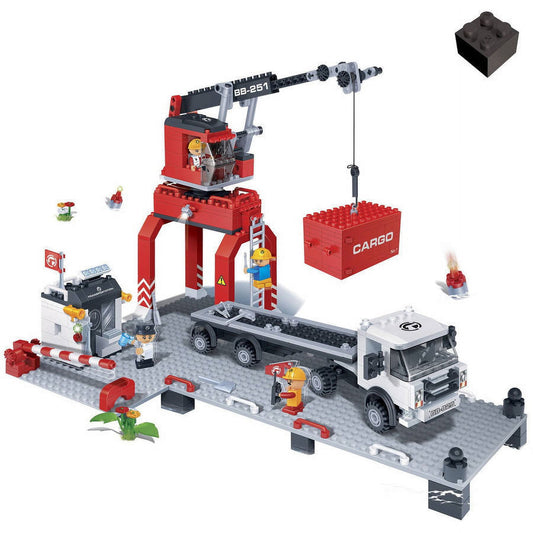 Cargo loading port building set with red crane, white cargo truck, red base platform, worker minifigures, and 538 brick pieces displayed on gray baseplate