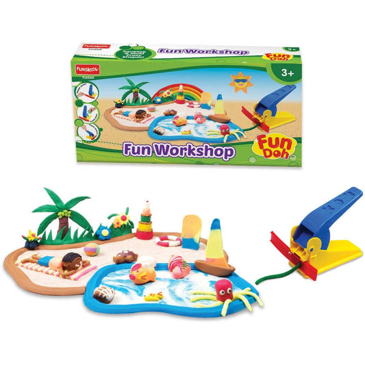 Fun Doh Workshop playset with beach-themed play mats, palm tree, colorful molded shapes, and blue air-powered tool with yellow and red accents